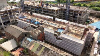 Exterior of Midland Mill fully scaffolded during heritage restoration in Leeds