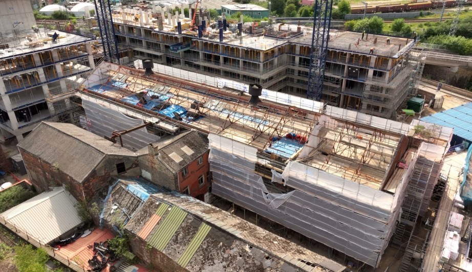 Exterior of Midland Mill fully scaffolded during heritage restoration in Leeds